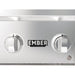 Close-up of Wildfire Ember built-in gas grill control panel with illuminated burner knobs and Ember by Wildfire branding