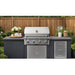 Wildfire Ember 32-inch built-in gas grill installed in modern outdoor kitchen with stainless steel doors and drawers